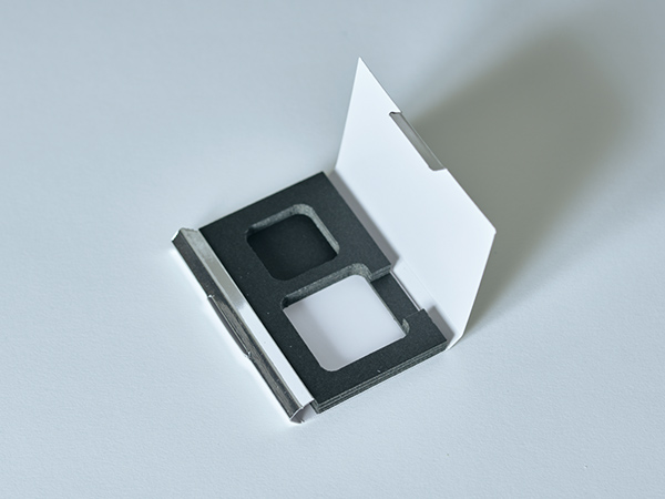 紙の反発力を仕組みに変えるロック機構の新発想